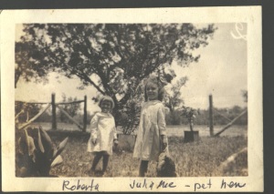 Roberta and Julia Mae with pet hen