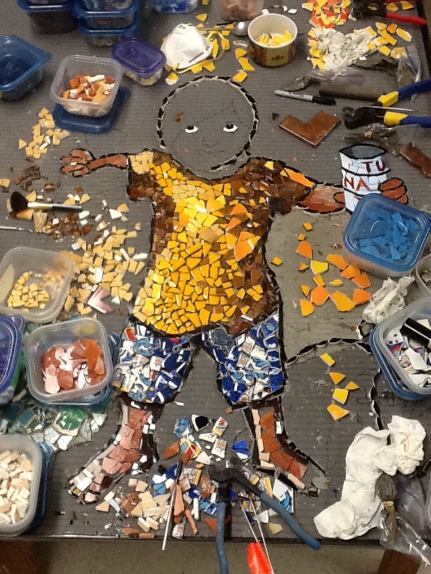 The community-built mosaic I'm supervising is coming along nicely.